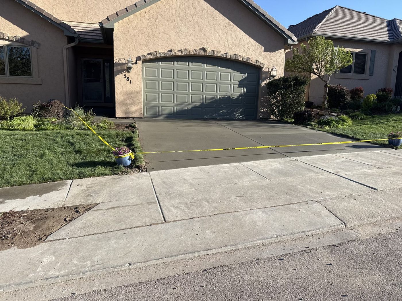 Driveway, stucco home