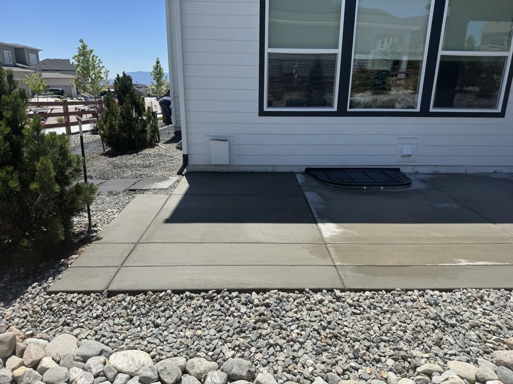 Patio with river-rock border