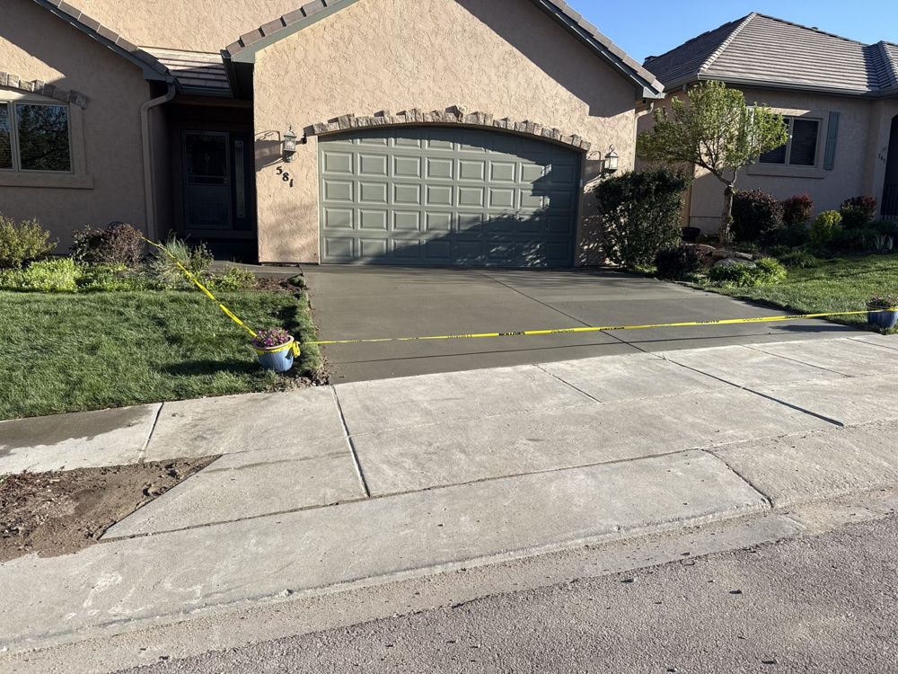 Driveway, stucco home