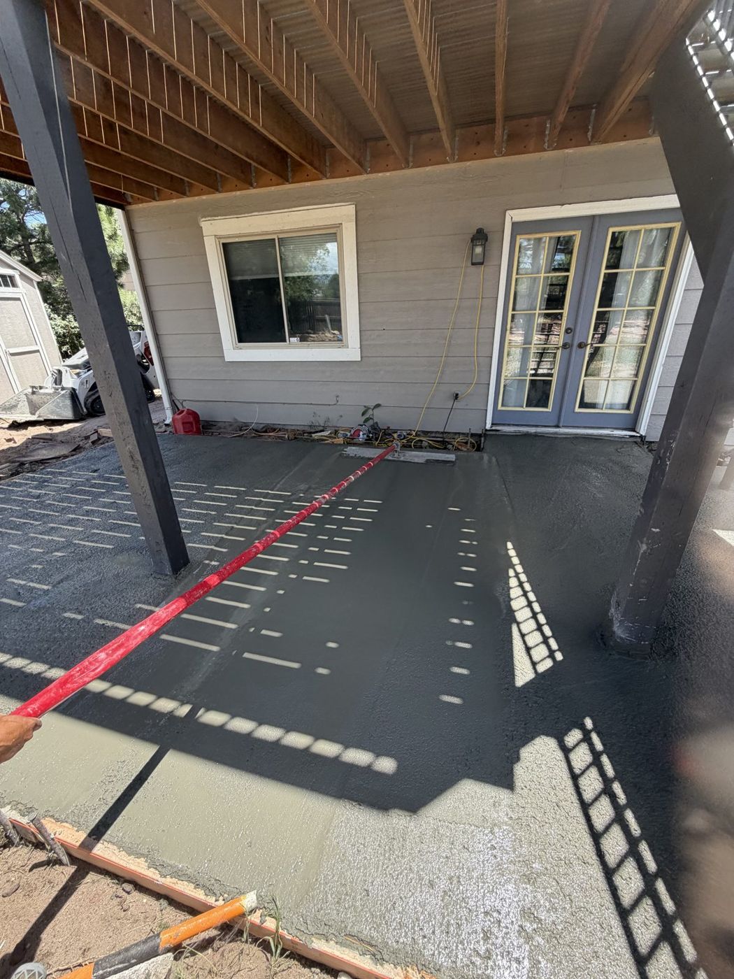 Rebar grid set on chairs before a patio pour