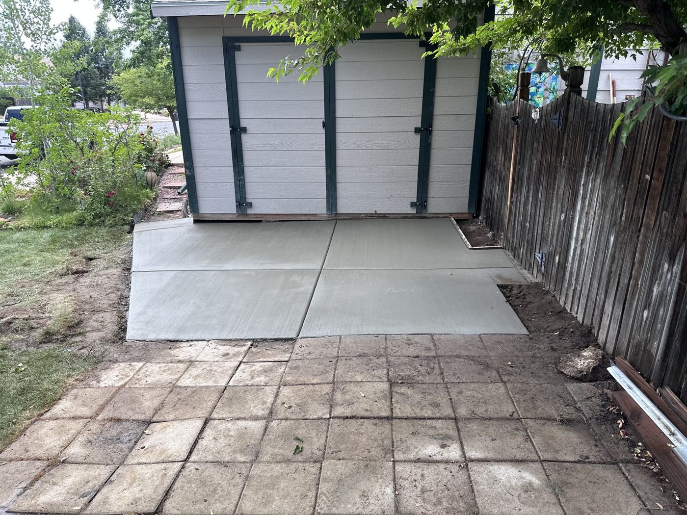 Shed pad joining existing pavers