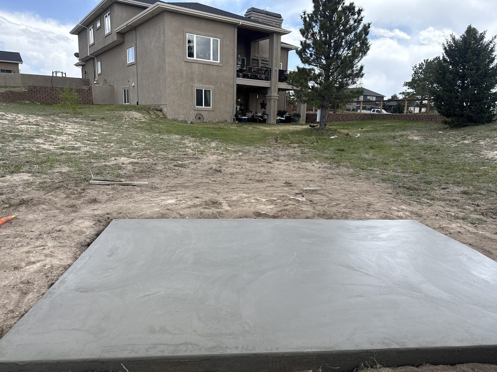 Large concrete pad on an open lot